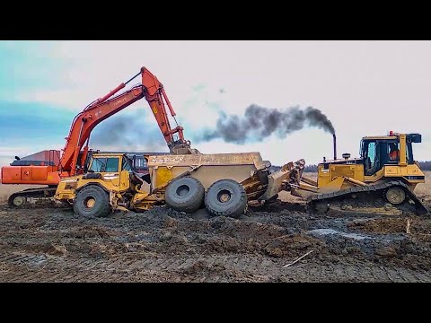 Видео: Доставить груз любой ценой! Мощные самосвалы и лесовозы работают на труднопроходимом бездорожье!