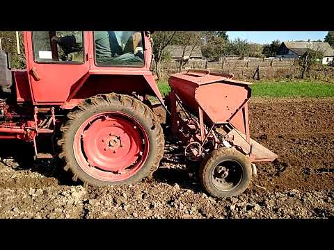 Видео: Т-25 и самодельная сеялка (2)