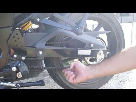 Видео: Подтяжка цепи Racer nitro 250