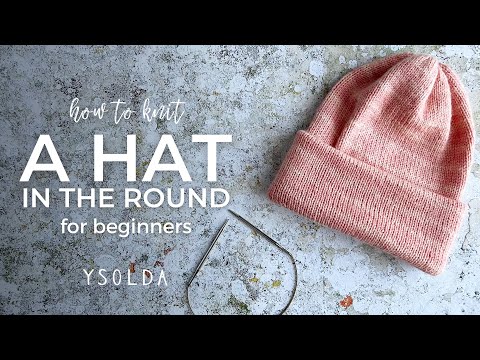 Видео: ВЯЗАНИЕ ШАПКИ ПО КРУГУ: простой урок для начинающих | вязание уютной шапки с тремя полями на круг...