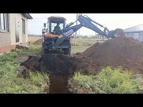 Видео: Рабочий день экскаватора погрузчика