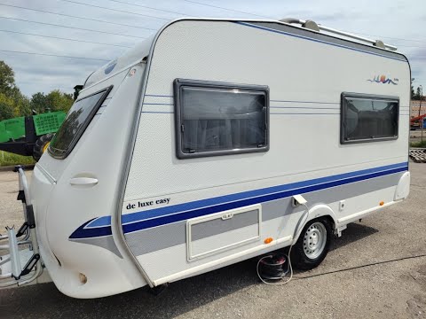 Видео: Обзор немецкого автодома-туриста,дома на колёсах Hobby 2005 года 3-4 места с палаткой и мувером