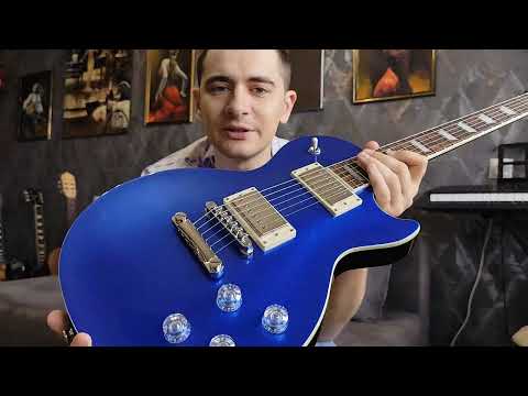 Видео: Обзор Epiphone Les Paul Muse