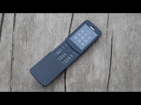 Видео: Nokia 8110 4g обзор - лучший кнопочный телефон 2020