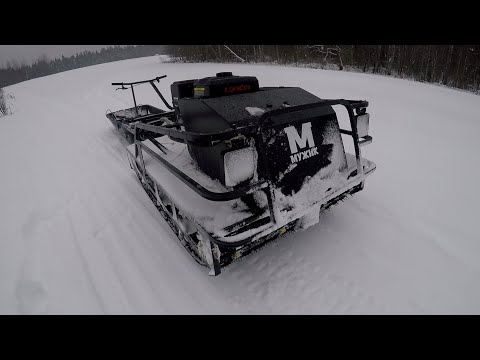 Видео: Двухгусеничный мотобуксировщик МУЖИК М760 20 лс. Пробный выезд.