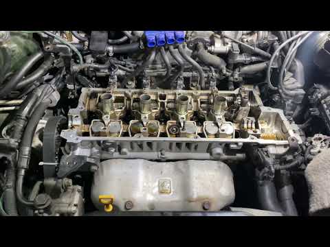 Видео: Киа Спортейдж 2 G4GC .регулировка зазоров клапанов. Непростая подточка шайб.