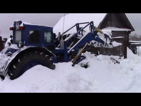 Видео: Уборка снега трактор Т 40