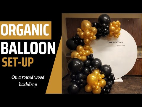 Видео: Мастер-класс по созданию гирлянды из органических воздушных шаров золотого и черного цветов