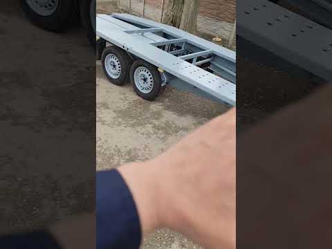 Видео: Прицеп лафет эвакуатор на балансирной подвеске