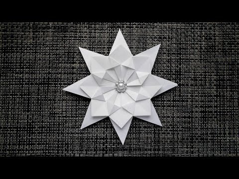 Видео: Как сделать снежинку из бумаги на Новый год и Рождество