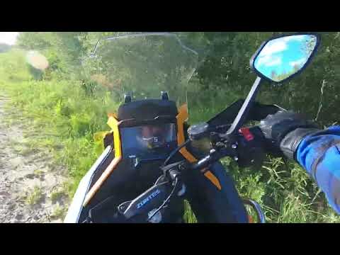 Видео: Как едет Zontes 703F по грунтовкам и асфальту на стоковой резине