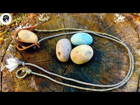 Видео: Shepherd Sling: потрясающая точность стрельбы примитивными каменными боеприпасами!