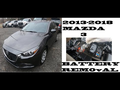 Видео: Как заменить аккумулятор Mazda 3 2013-2018