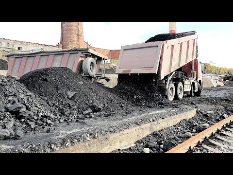 Видео: Самосвал Volvo с прицепом MEGA - выгрузка каменного угля. Unloading of coal.
