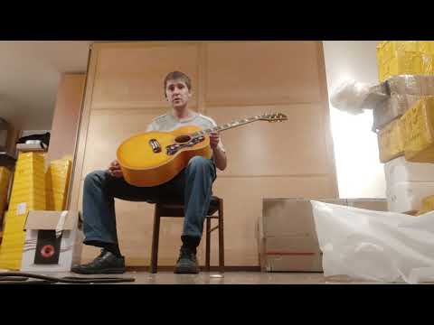 Видео: Обзор китайской реплики акустической гитары Gibson J-200