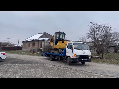 Видео: Эвакуатор Hyundai 72, тащит без ￼ проблем, экскаватор komatsu 58-й ￼