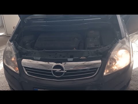 Видео: Как заменить лампы ближнего света и лампы габаритных огней на Опель Зафира