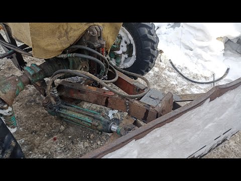 Видео: Гидроповорот на передний отвал