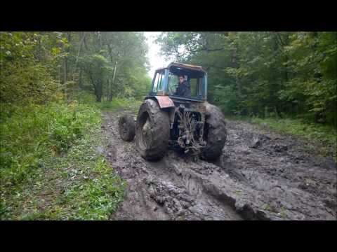 Видео: Трактор. Трактор в грязи. Трактор мтз тащит уаз.