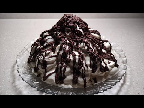 Видео: НЕВЕРОЯТНО ВКУСНЫЙ ТОРТ "ВУЛКАН" Торт со взбитыми сливками, орехами и шоколадом.