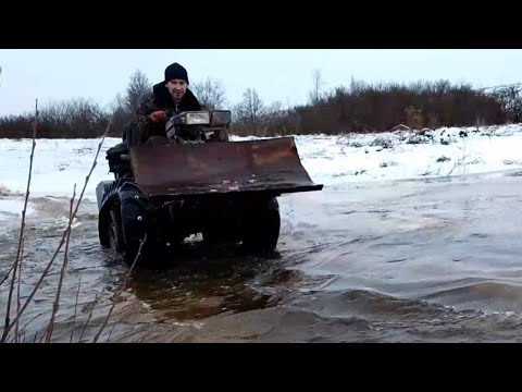 Видео: Гусеничный минитрактор по пересечённой местности