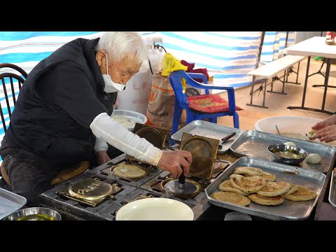 Видео: Лучшая уличная еда, представляющая Корею! Популярные сладкие блины, Hotteok Top 7