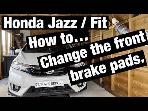 Видео: Замена передних тормозных колодок Honda Jazz Fit