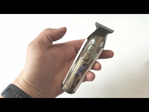 Видео: KEMEI-5027 триммер для стрижки волос
