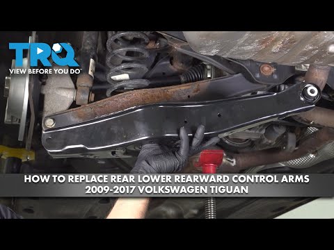 Видео: Как заменить задние нижние рычаги подвески на Volkswagen Tiguan 2009-2017
