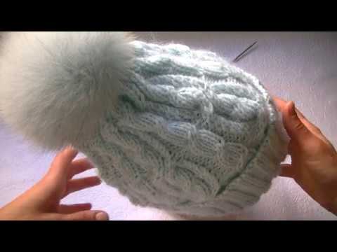 Видео: Вяжем шапку с аранами спицами