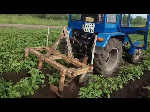 Видео: Самодельный трактор окучивание картофеля (2021)