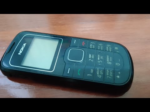 Видео: Обзор Телефона Nokia 1202.