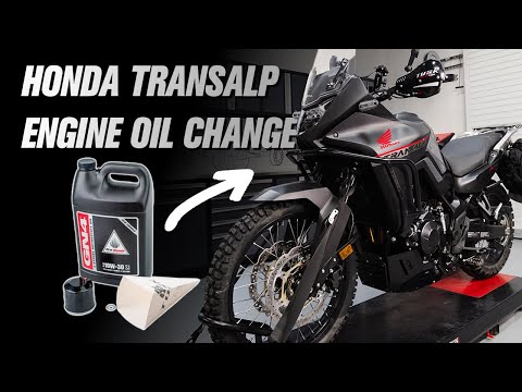 Видео: Как заменить моторное масло и фильтр на Honda Transalp XL750