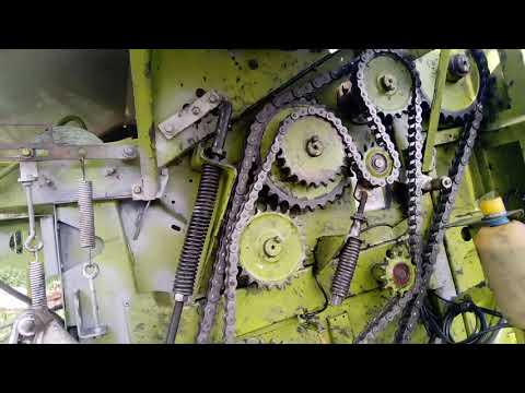 Видео: Замена цепей пресс-подборщика Claas 250RC