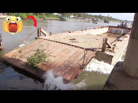Видео: [692] Буксир на большой скорости протолкнул баржу через ворота плотины, очень резко.