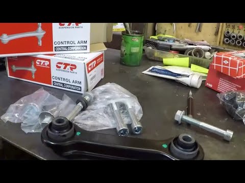 Видео: Замена поперечных рычагов.Задняя подвеска.2008 Mitsubishi Outlander .