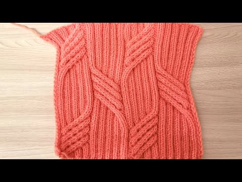 Видео: Оригинальный узор с косами спицами для шарфов, шапок и теплых свитеров