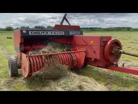 Видео: Сенокос раскачивается, прессуем сено пресс-подборщик DEUTZ-FAHR HD 320 на тракторе т-25.