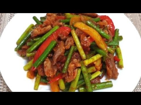 Видео: Жареные чесночные стрелки с мясом и овощами по-корейски! Простой и вкусный рецепт!