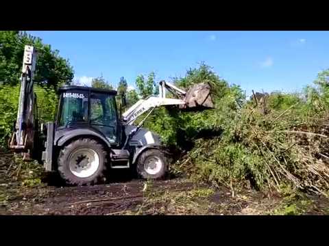 Видео: Планировка участка экскаватором-погрузчиком TEREX 860 SX. Расчистка заброшенного участка.Часть 1