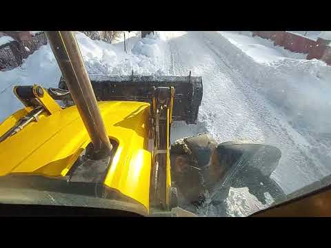 Видео: JCB читка снега.