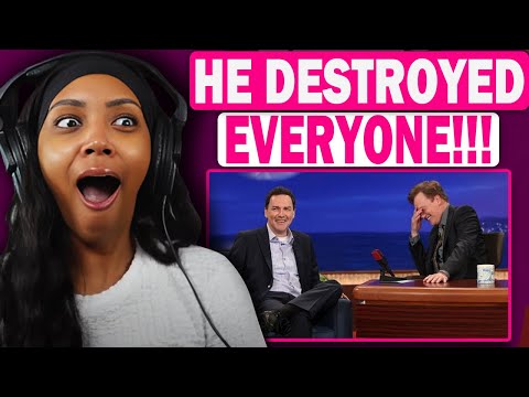 Видео: ПЕРВЫЙ РАЗ РЕАКЦИЯ НА | Норм Макдональд ОБЖАРИВАЕТ людей