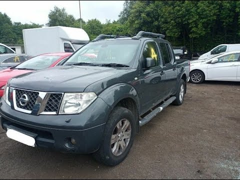 Видео: Обзор машины Nissan Navara (D40) 2.5 D YD25DDTI 2005г. МКПП Англия G111