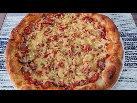 Видео: Піца на такому тісті - просто супер. Готуйте та насолоджуйтесь!