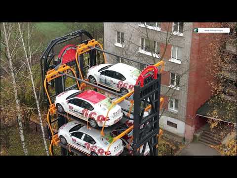 Видео: Роторная (карусельная) парковка (КНР) на 12 джипов. Испытание под нагрузкой