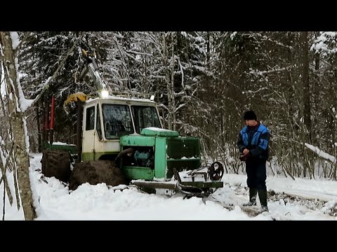 Видео: T-150. Пришлось использовать лебедку.