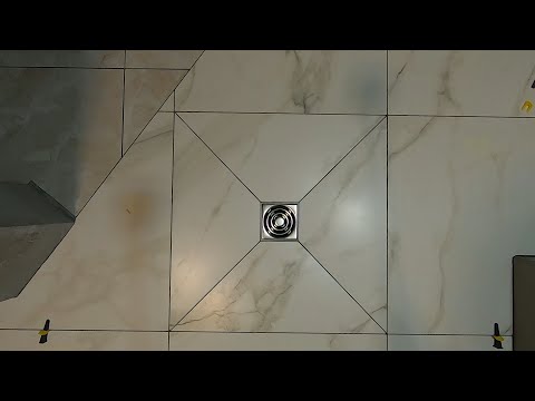 Видео: Оформление разуклонки из плитки к трапу.