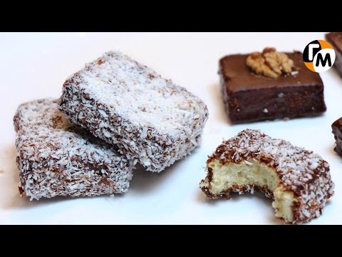 Видео: Пирожные Ламингтон Рецепт | Бисквиты в шоколадной глазури с кокосом -- Голодный Мужчина, Выпуск 63