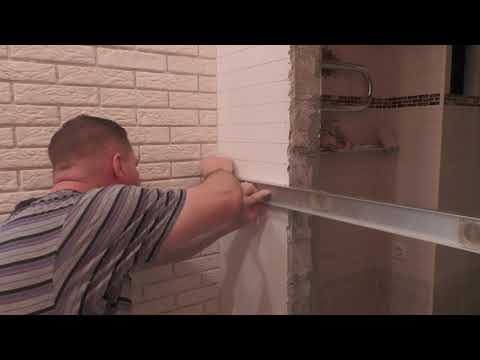 Видео: Укладка декоративного камня в коридоре. Отделка арки.