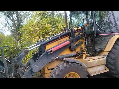 Видео: Обзор экскаватора-погрузчика CATERPILLAR 432D Плюсы и минусы с точки зрения оператора